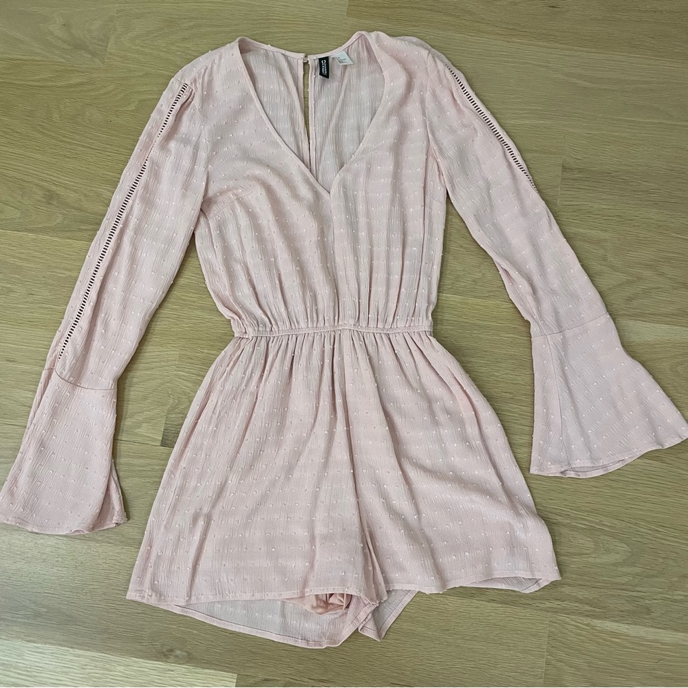 Pink dotted long sleeved romper size xs